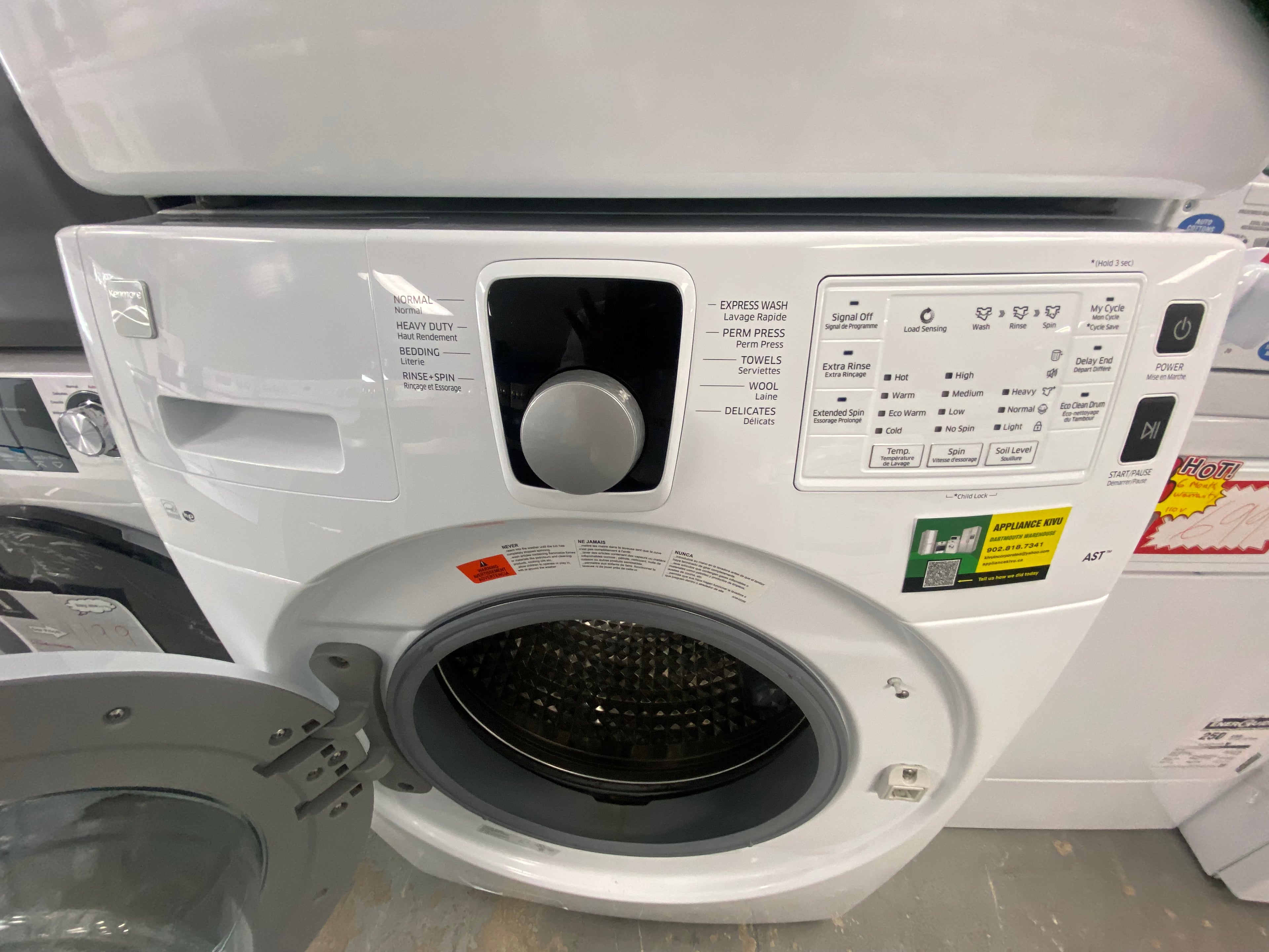 White Kenmore Washer and Dryer Set with warranty