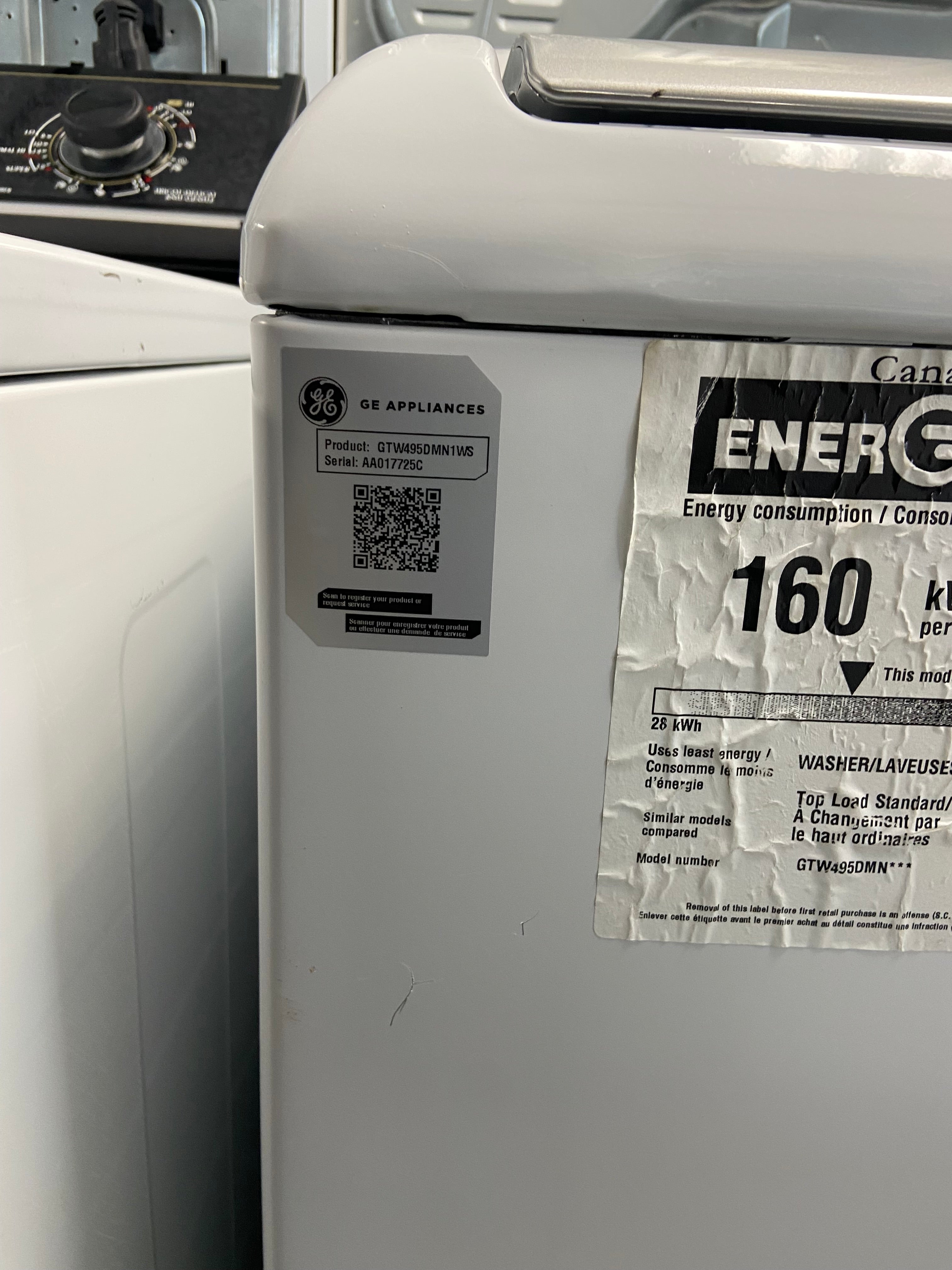 White GE GTW495DMN1WS Top Load Washer (Refurbished)