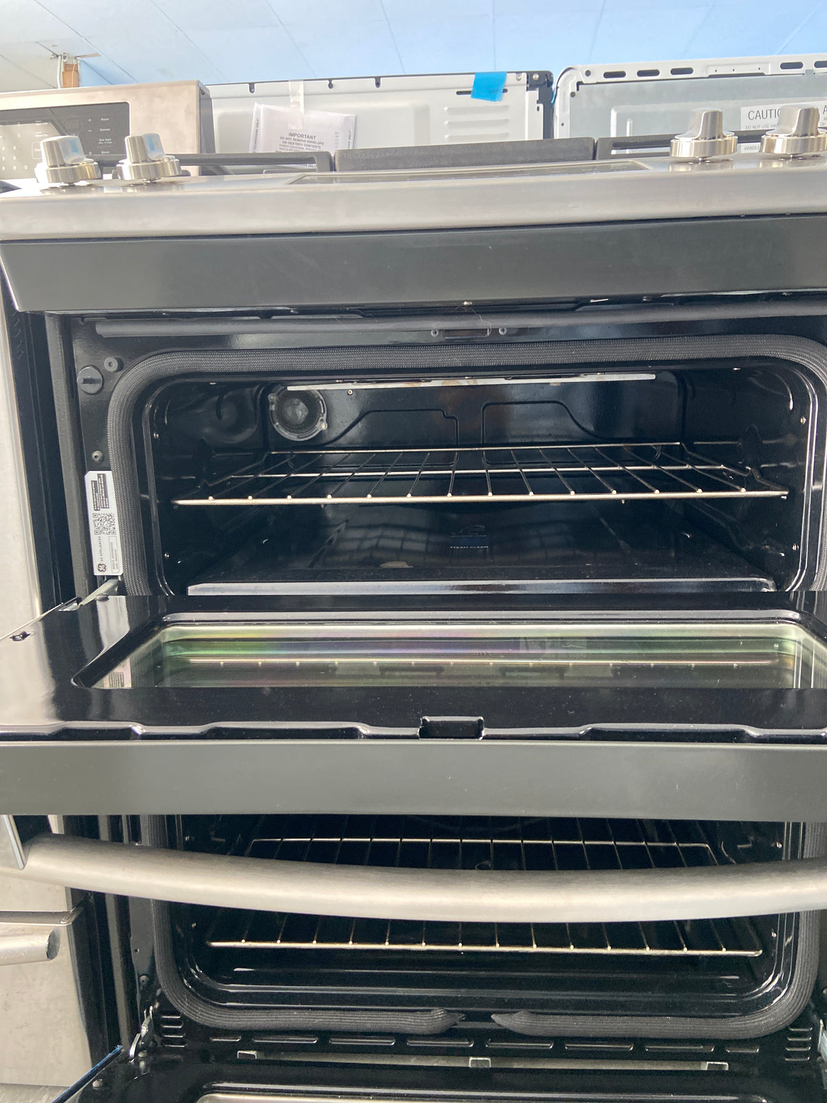 GE stainless slide in gas/propane double oven stove, JCGSS86SP2SS, “Open Box”, 6 Months Warranty