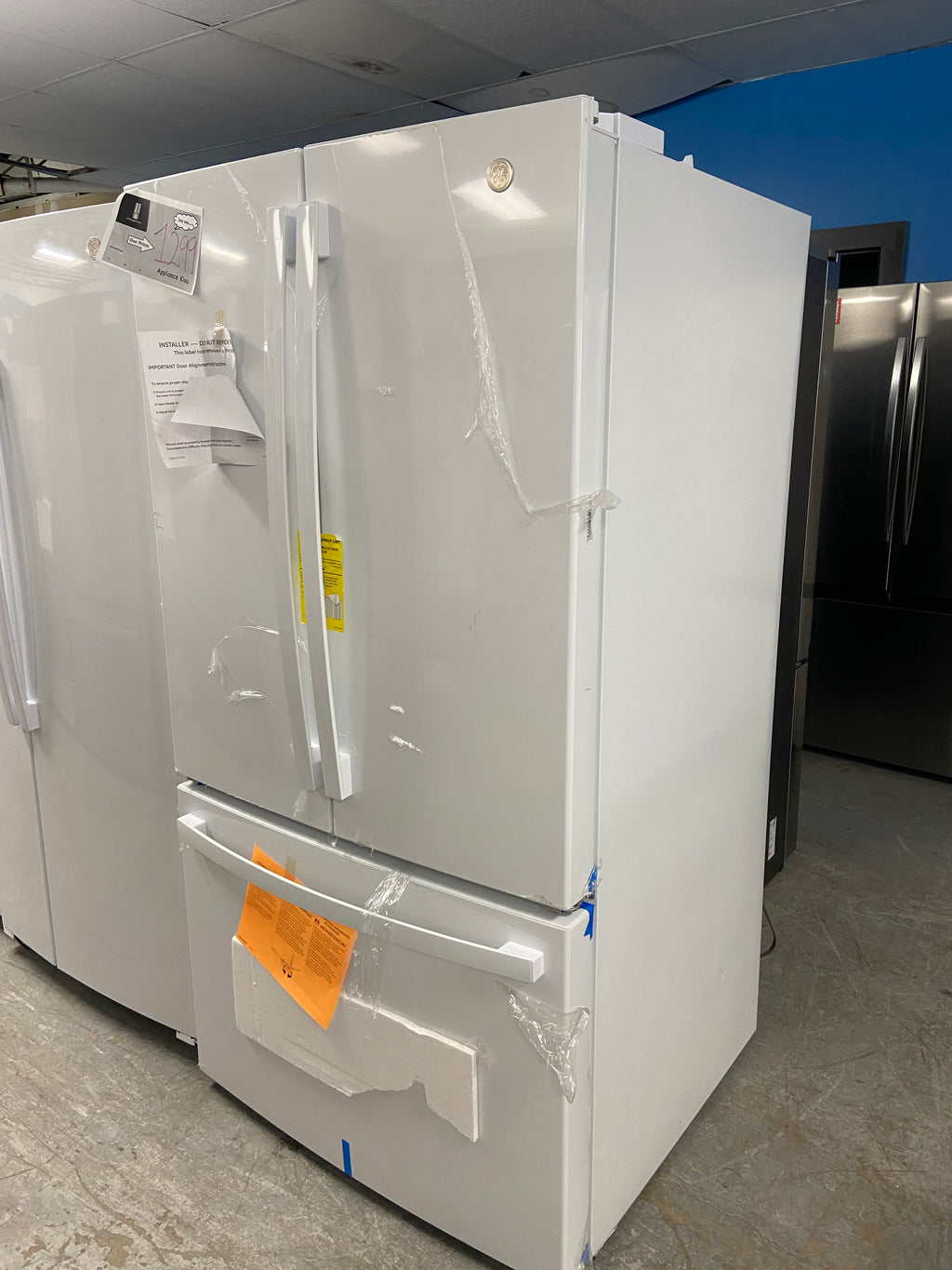 GE GNE27JGMYFWW French Door Refrigerator, 36 inch Width, 26.7 cu. ft. Capacity, Water Dispenser (Interior), Ice Dispenser (Freezer Located), White colour