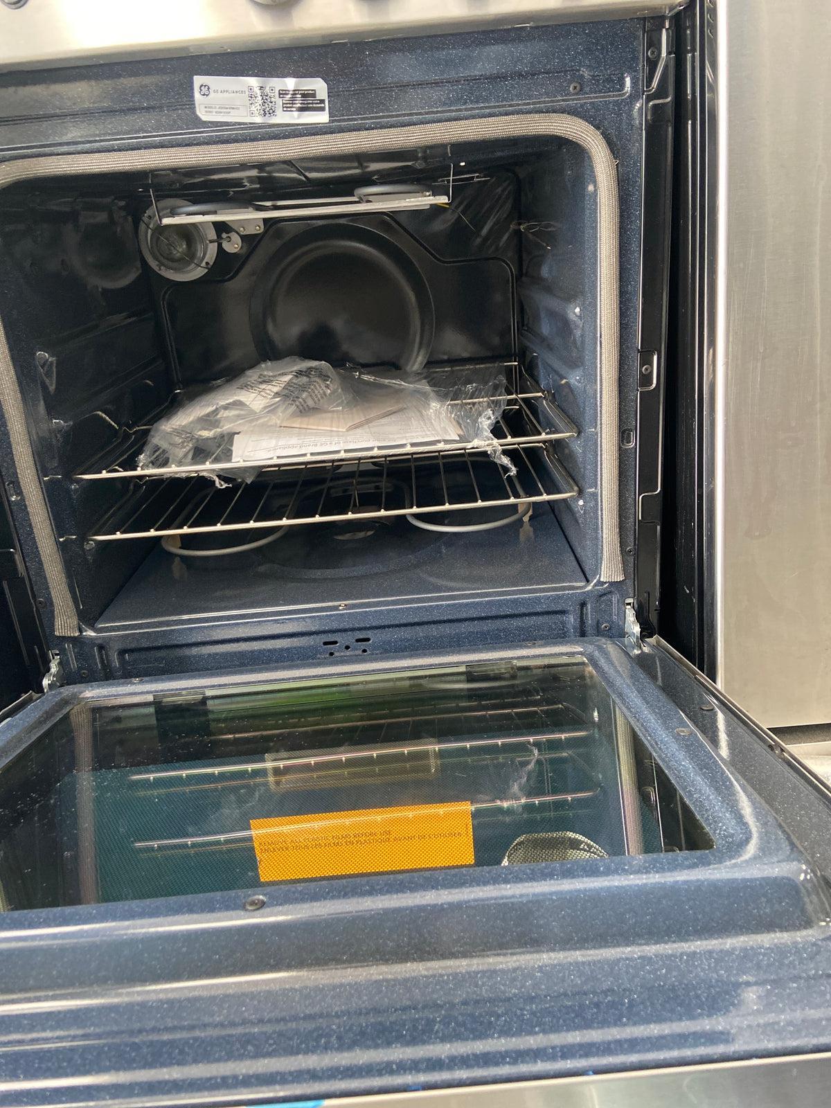 GE stainless apartment size(24”) glass top stove, JCAS640RM4SS,  “Brand New”, 6 Months Warranty