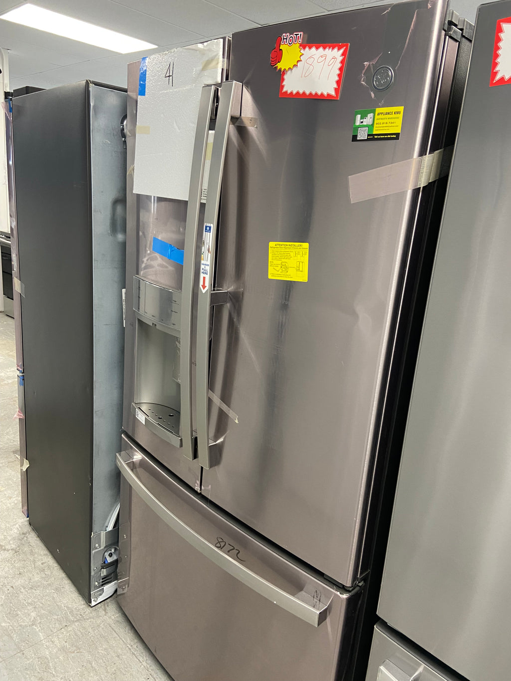 GE Brand New Stainless Fridge with Water dispenser