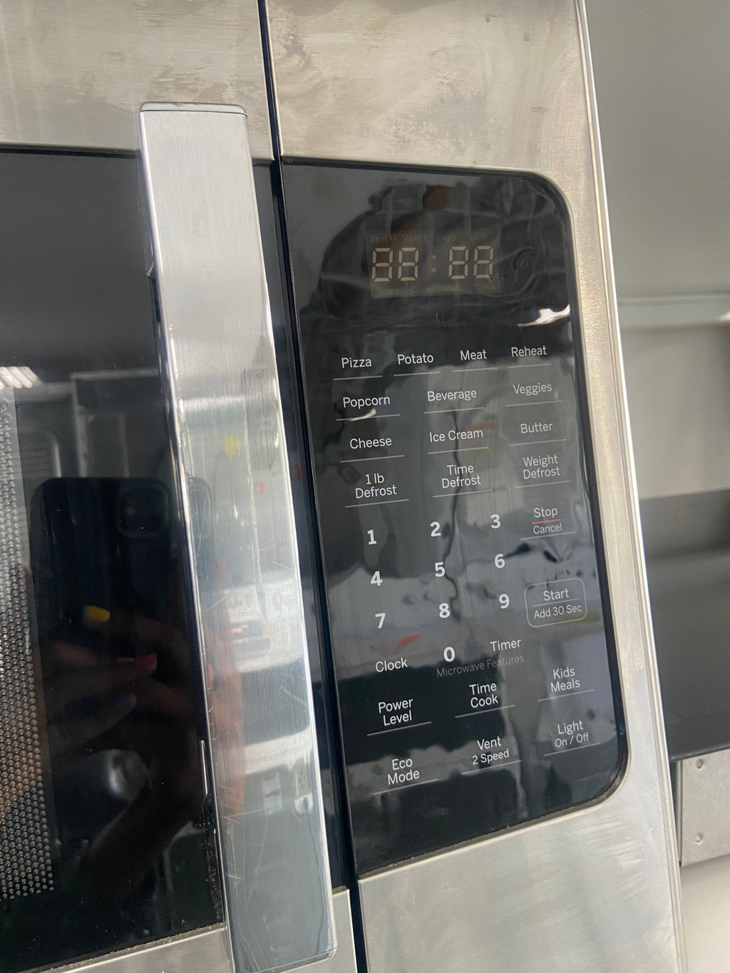Stainless Over The Range Microwave "Refurbished"