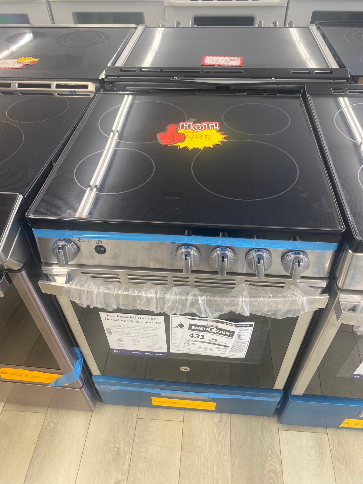 24” GE glass top stove, slide In, "Brand New"