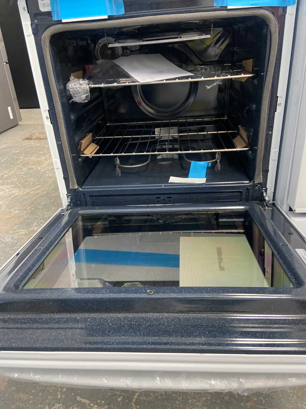 GE apartment size(24”) slide in stove,  JCAS300DM2WW , “Brand New”, 1 Year Warranty