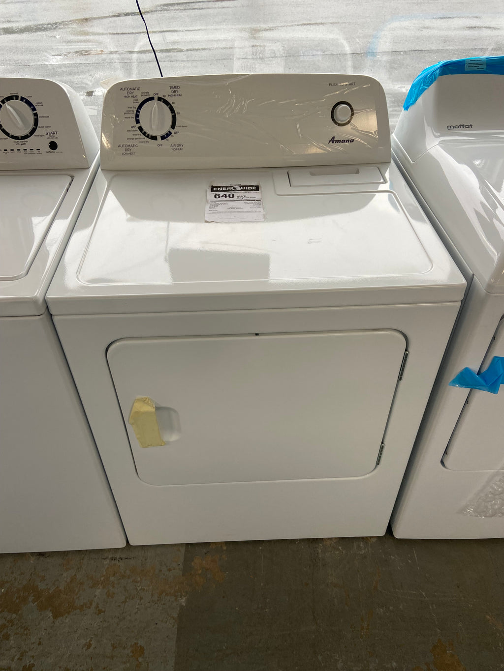 4.4 cu. ft. Top-Load Washer with High Efficiency Agitator, Measuring at a width of 29 inches, the Amana YNED4655EW1 Dryer