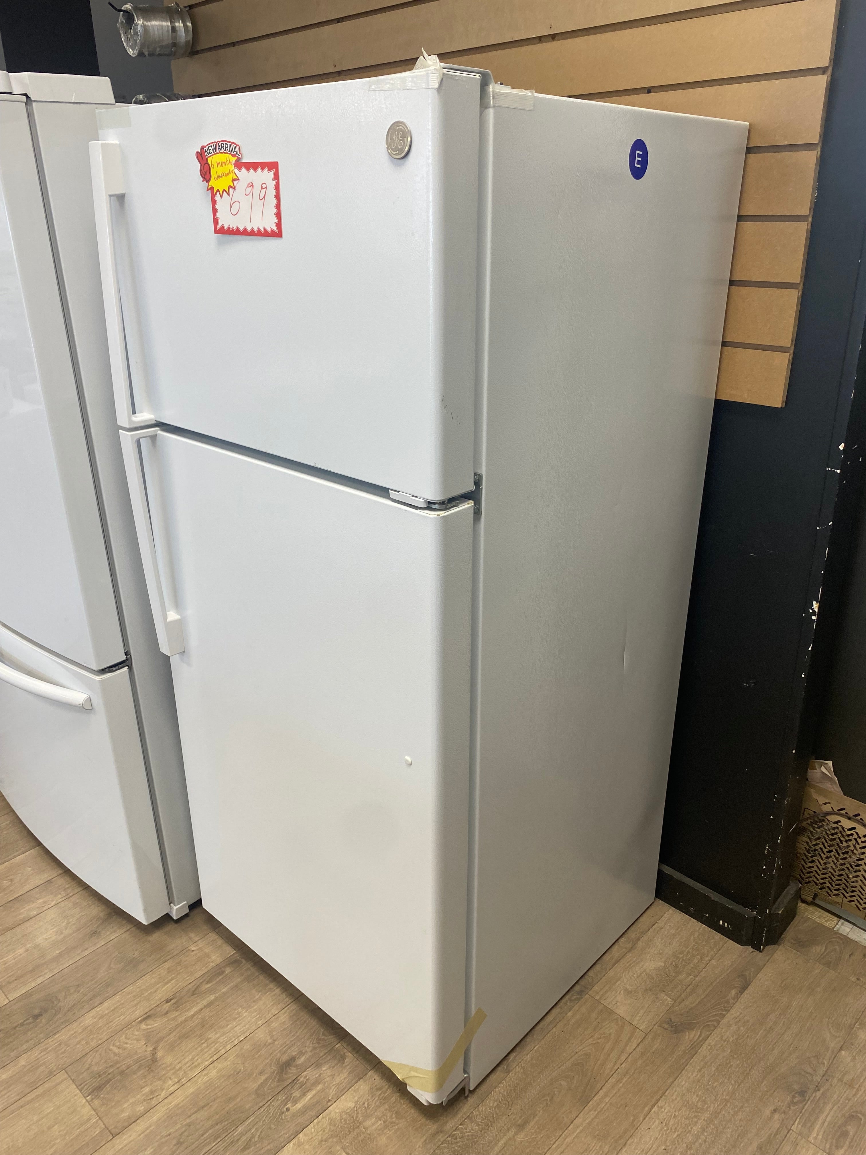 GE 28-inch 16.6 cu. ft. Top Freezer, No Frost, Reversible Door Refrigerator in White - ENERGY STAR®