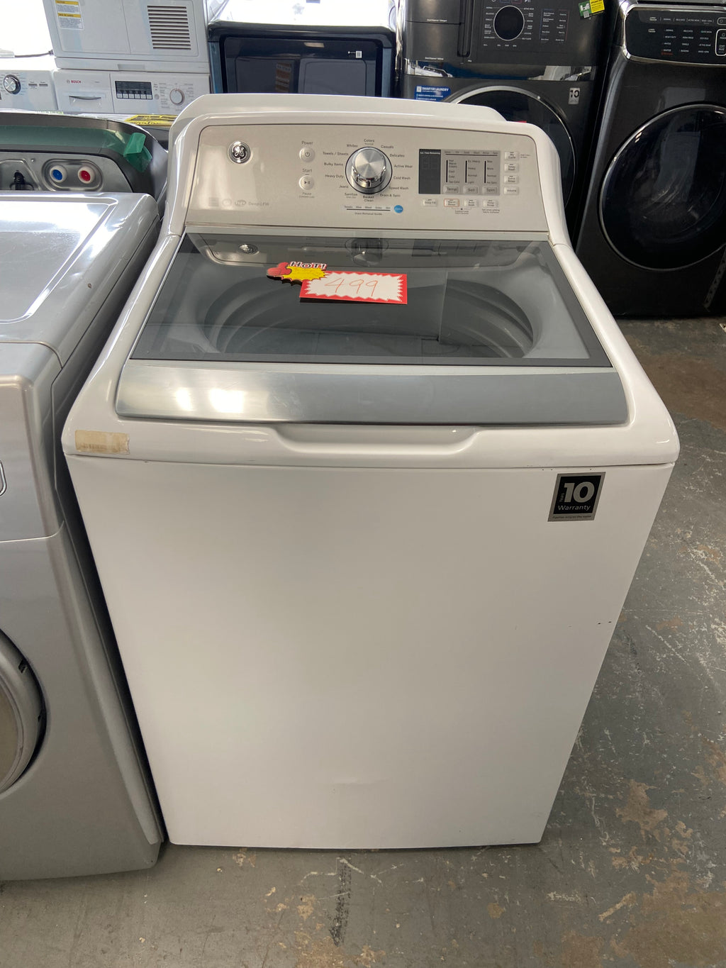 White GE GTW680BMM1WS Top Load Washer (Refurbished)