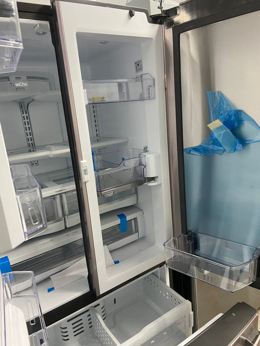 GE Brand New Stainless Fridge with Water dispenser