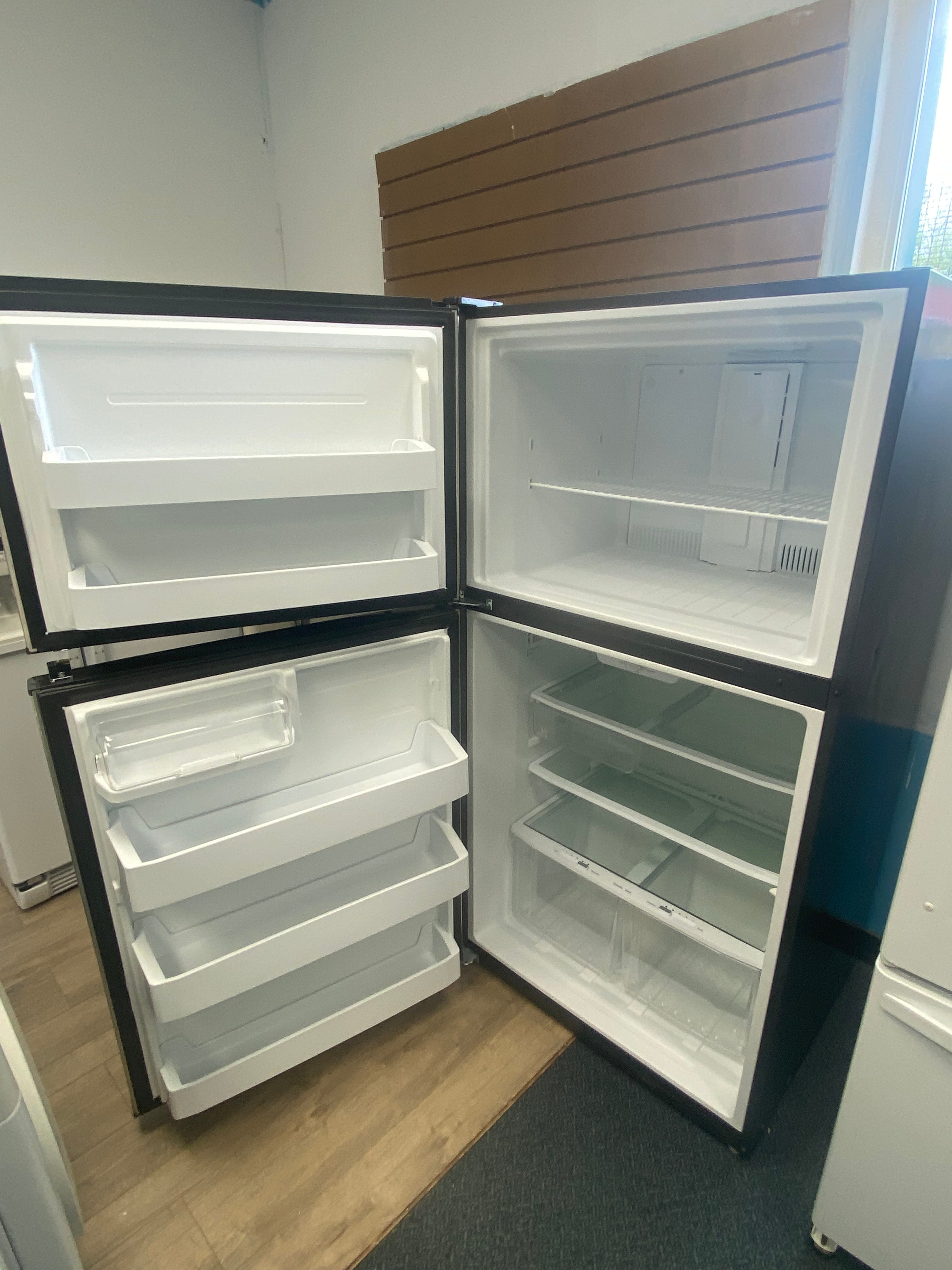 33 inch GE® ENERGY STAR® 21.1 Cu. Ft. Top-Freezer Refrigerator GTE21GSHSS "Refurbished"