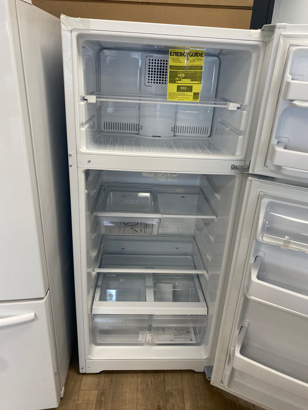 GE 28-inch 16.6 cu. ft. Top Freezer, No Frost, Reversible Door Refrigerator in White - ENERGY STAR®