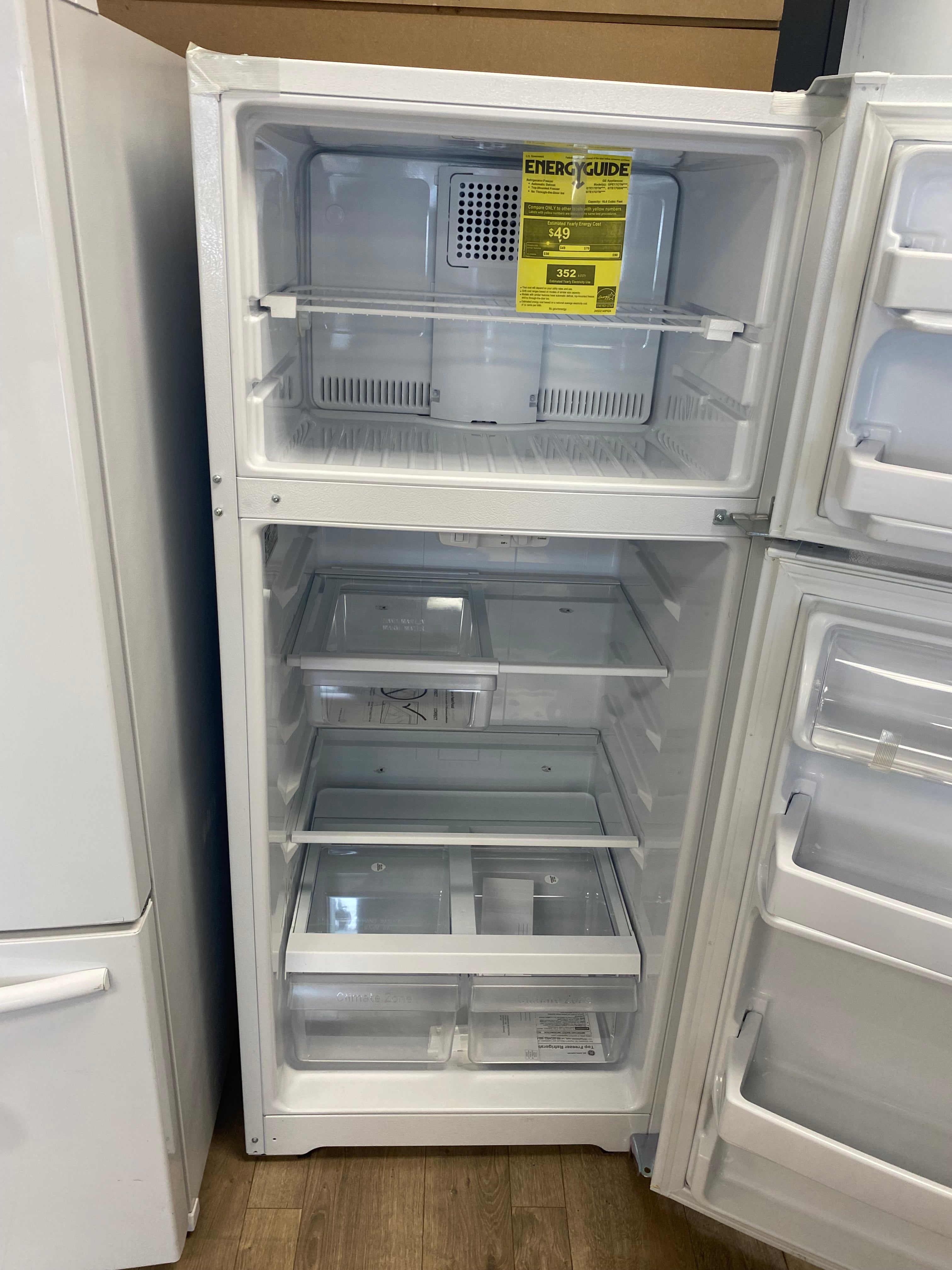 GE 28-inch 16.6 cu. ft. Top Freezer, No Frost, Reversible Door Refrigerator in White - ENERGY STAR®