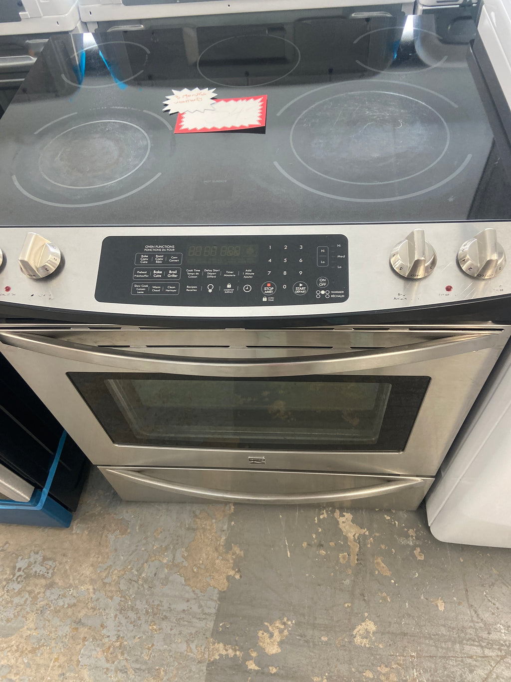 Kenmore glass top stove, serial: NF24224694 “Refurbished”, 3 Months Warranty