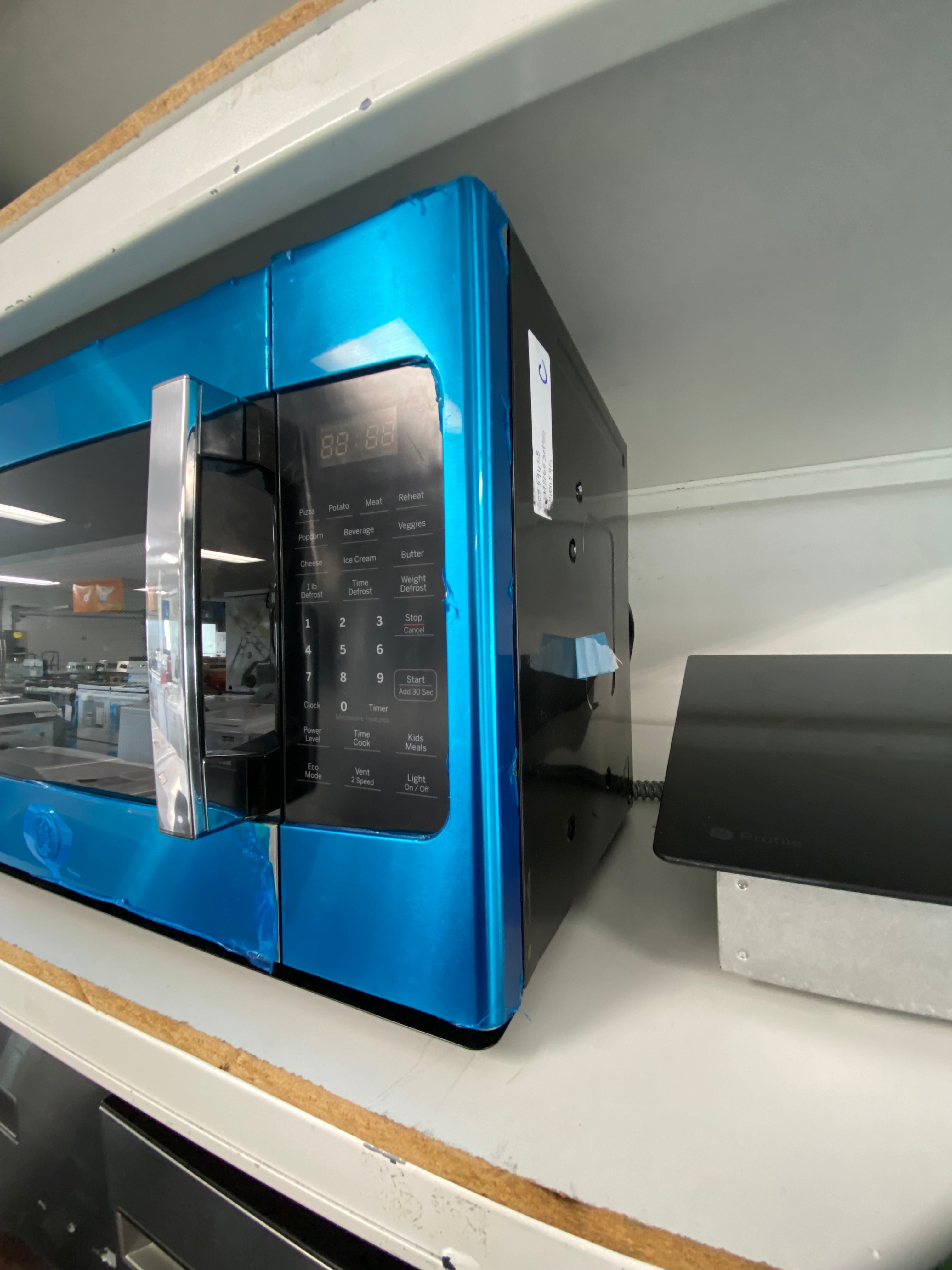 Stainless GE JVM2165SMSS Over The Range Microwave (Scratch and Dent)