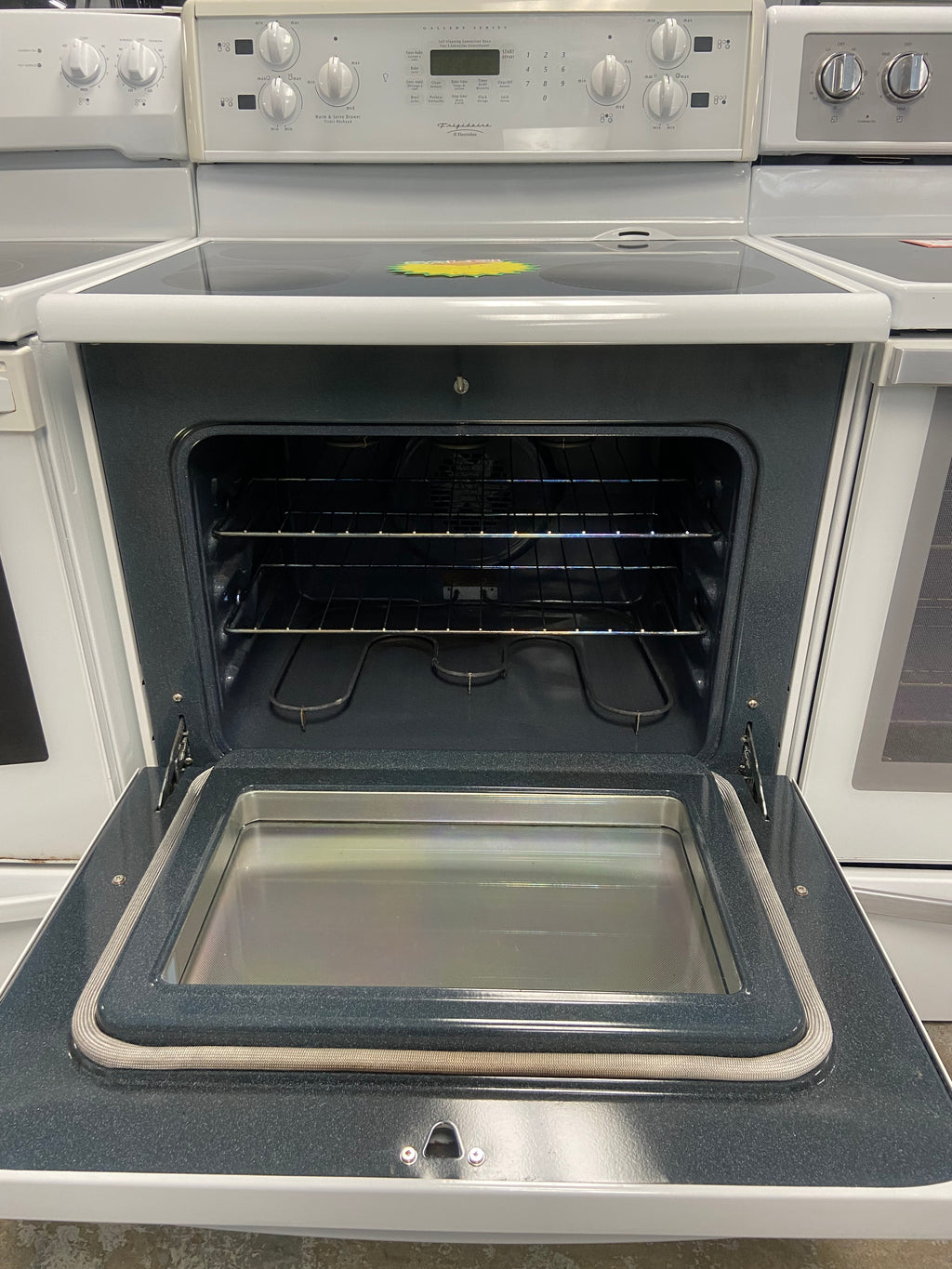 White 30” Frigidaire PGLEF388CS1 Glass Top Stove "Refurbished"
