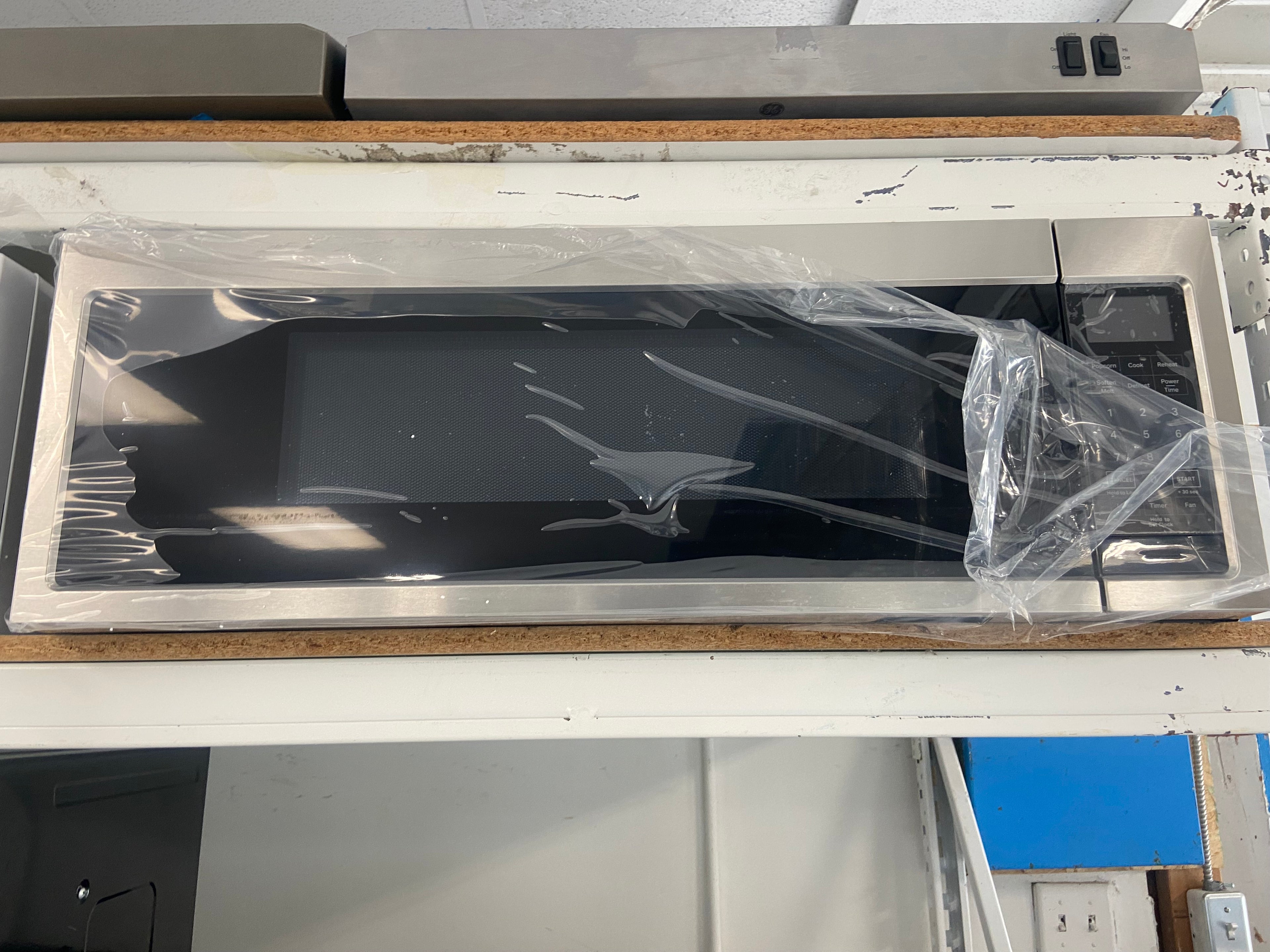 Whirlpool Stainless Over The Range Microwave "Brand New"