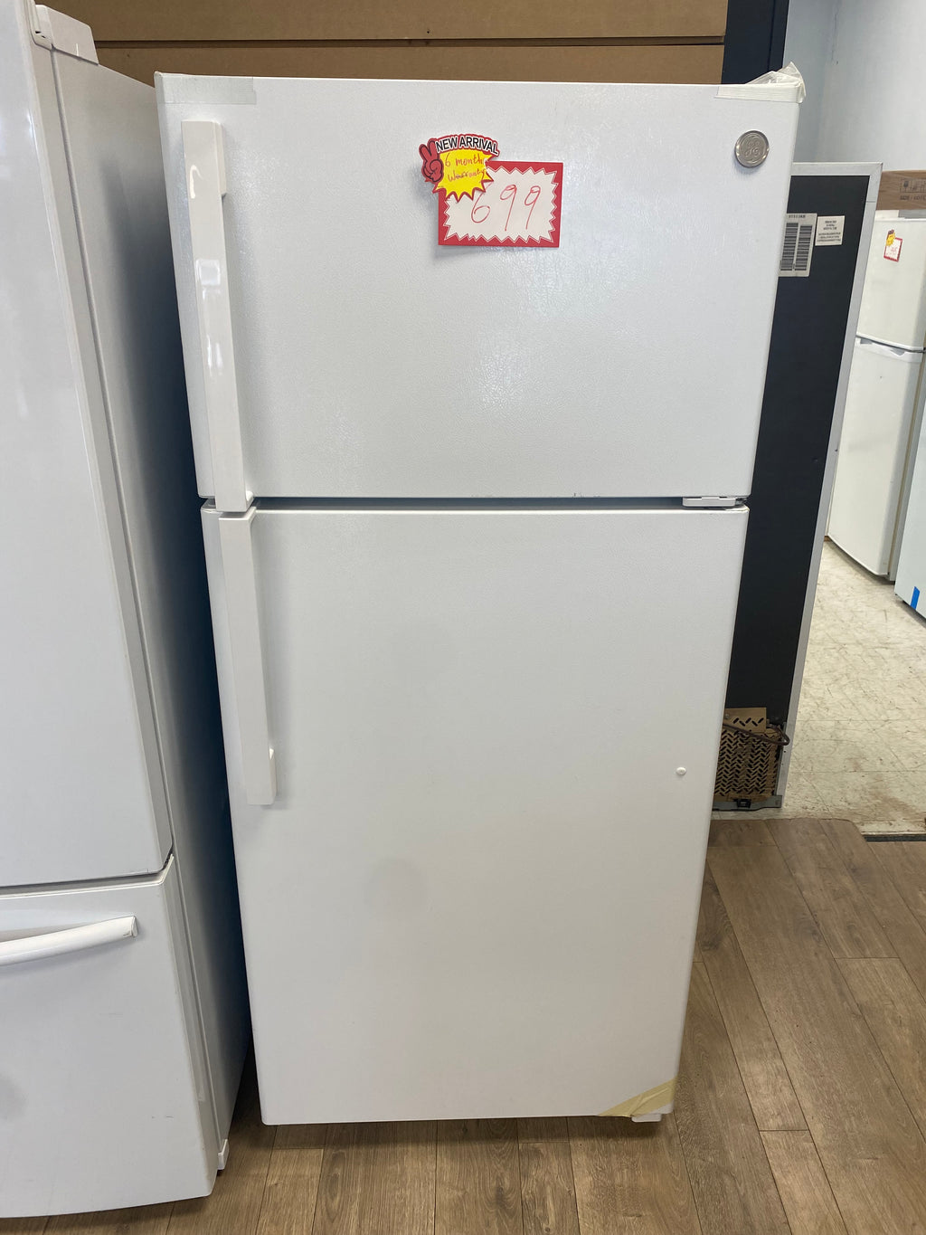 GE 28-inch 16.6 cu. ft. Top Freezer, No Frost, Reversible Door Refrigerator in White - ENERGY STAR®