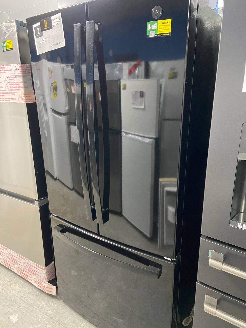 Black Stainless GE fridge
