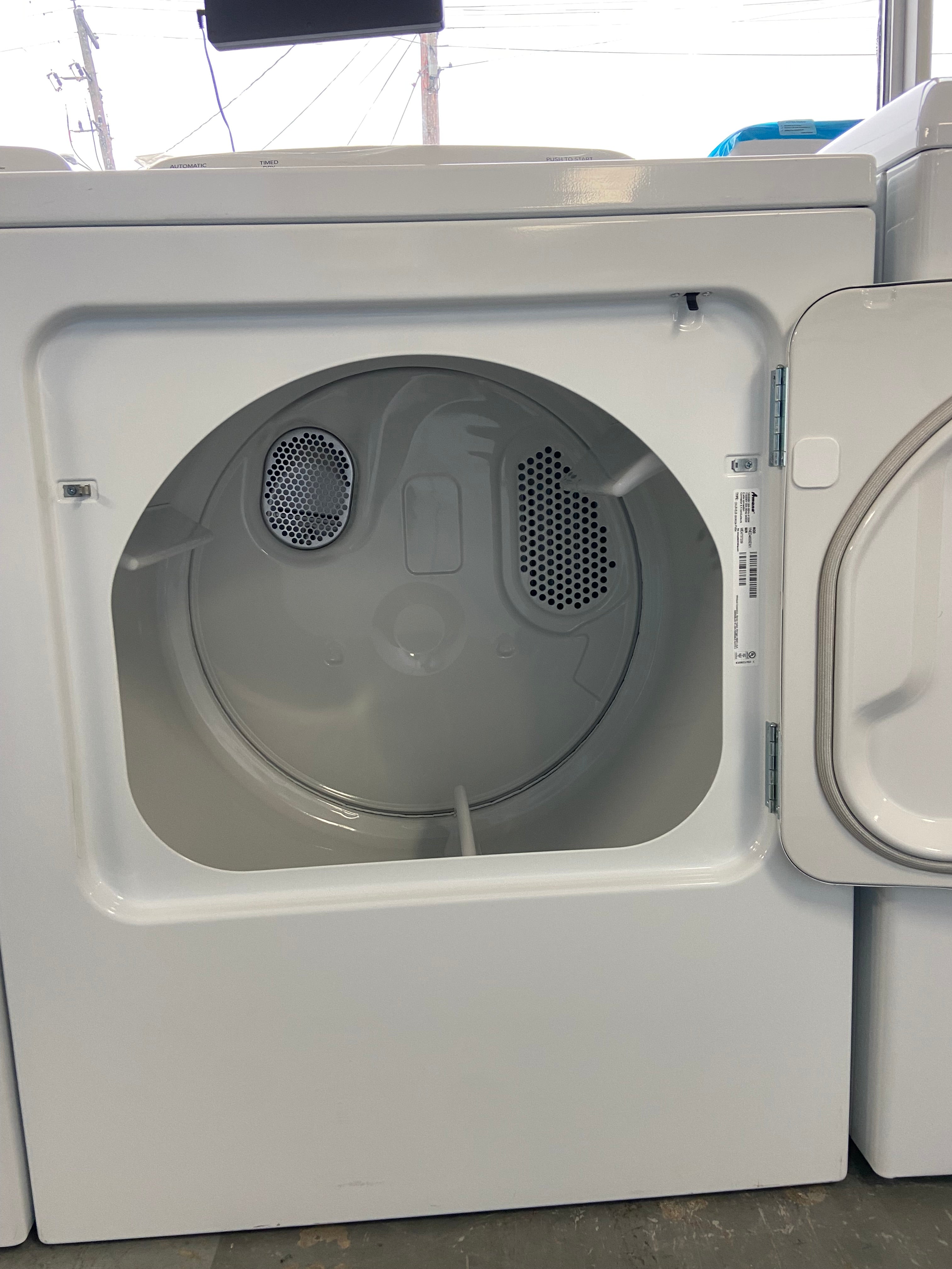 4.4 cu. ft. Top-Load Washer with High Efficiency Agitator, Measuring at a width of 29 inches, the Amana YNED4655EW1 Dryer