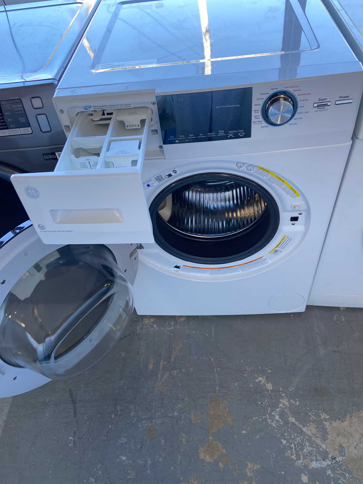 GE white 24” Apartment size washer/dryer combo (2 in 1), “Open Box”