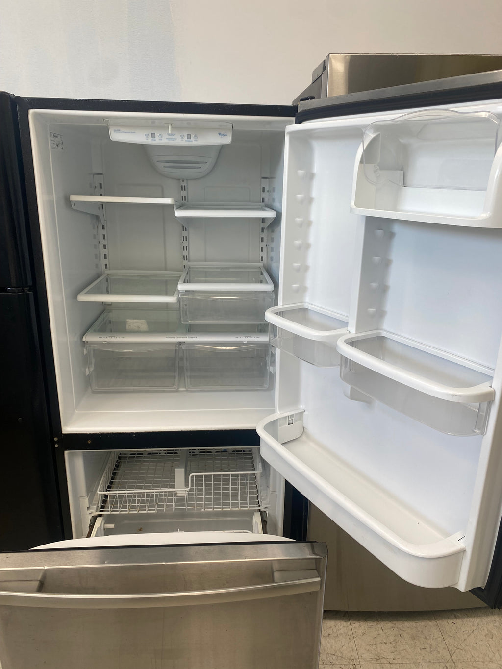 Stainless steel 30” bottom mount Whirlpool Fridge used