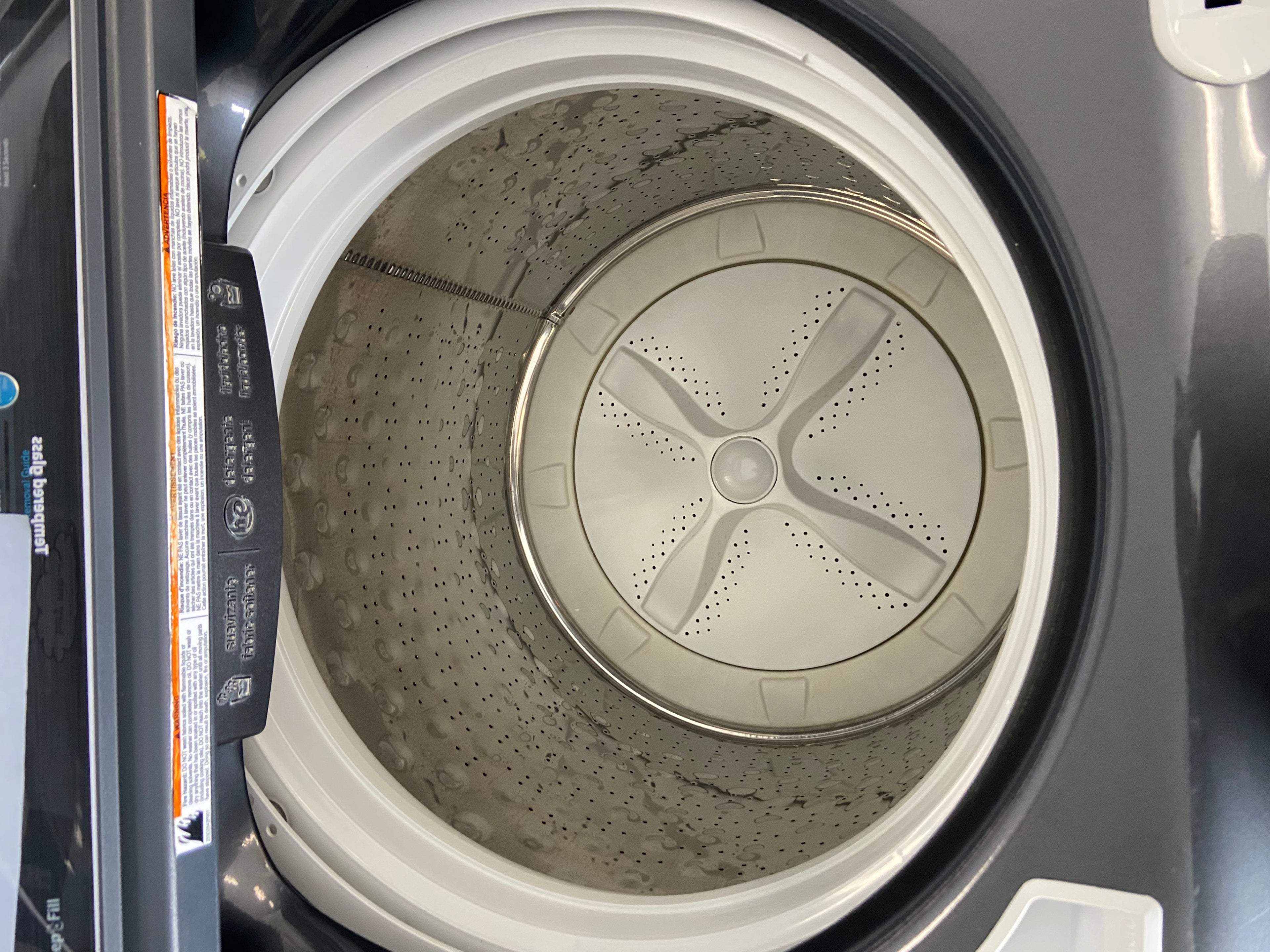 Black GE GTW680BMR2DG Top Load Washer (Refurbished)