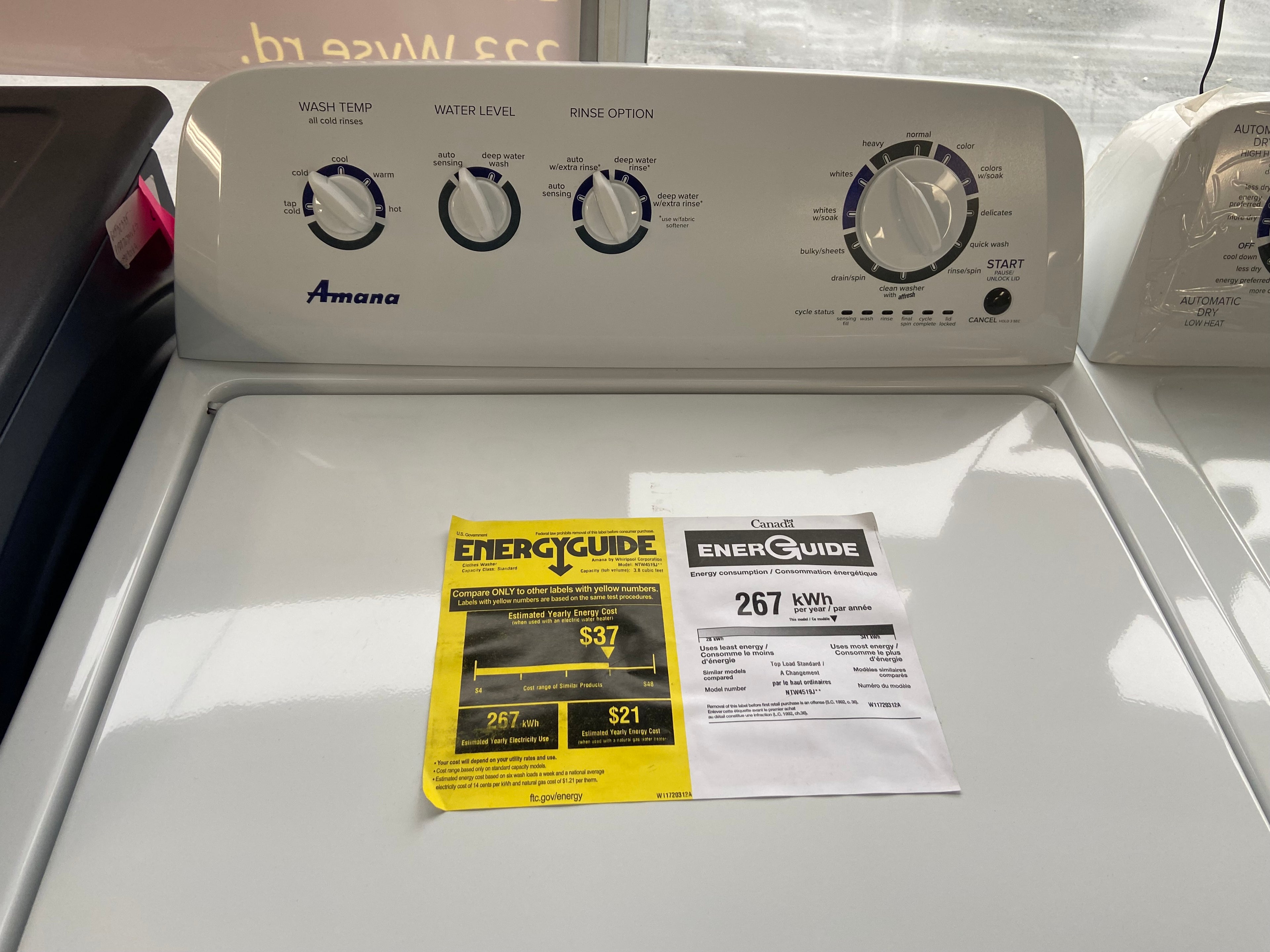 4.4 cu. ft. Top-Load Washer with High Efficiency Agitator, Measuring at a width of 29 inches, the Amana YNED4655EW1 Dryer