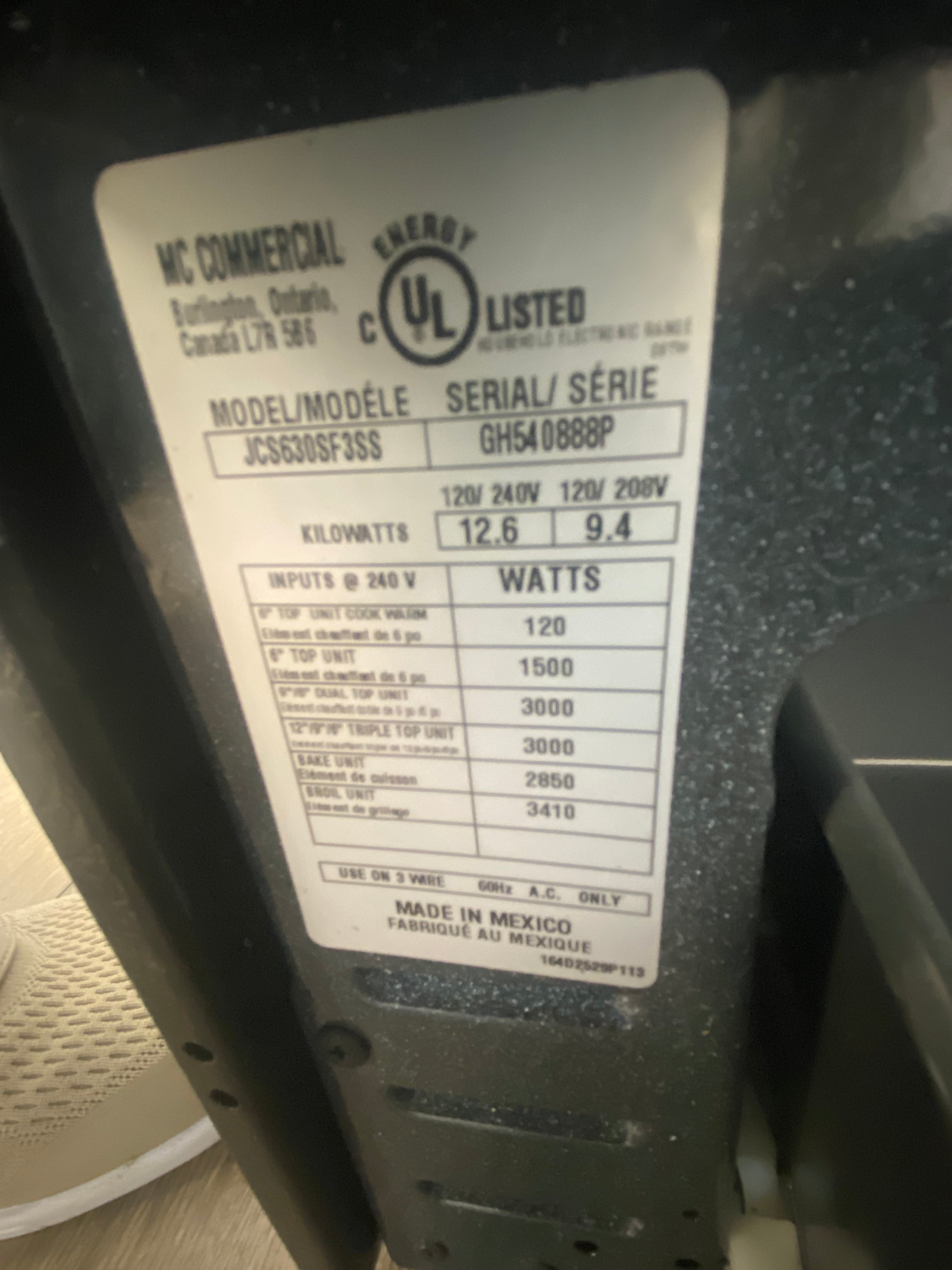 GE Slide in Glass top stove, "Refurbished" Stainless.