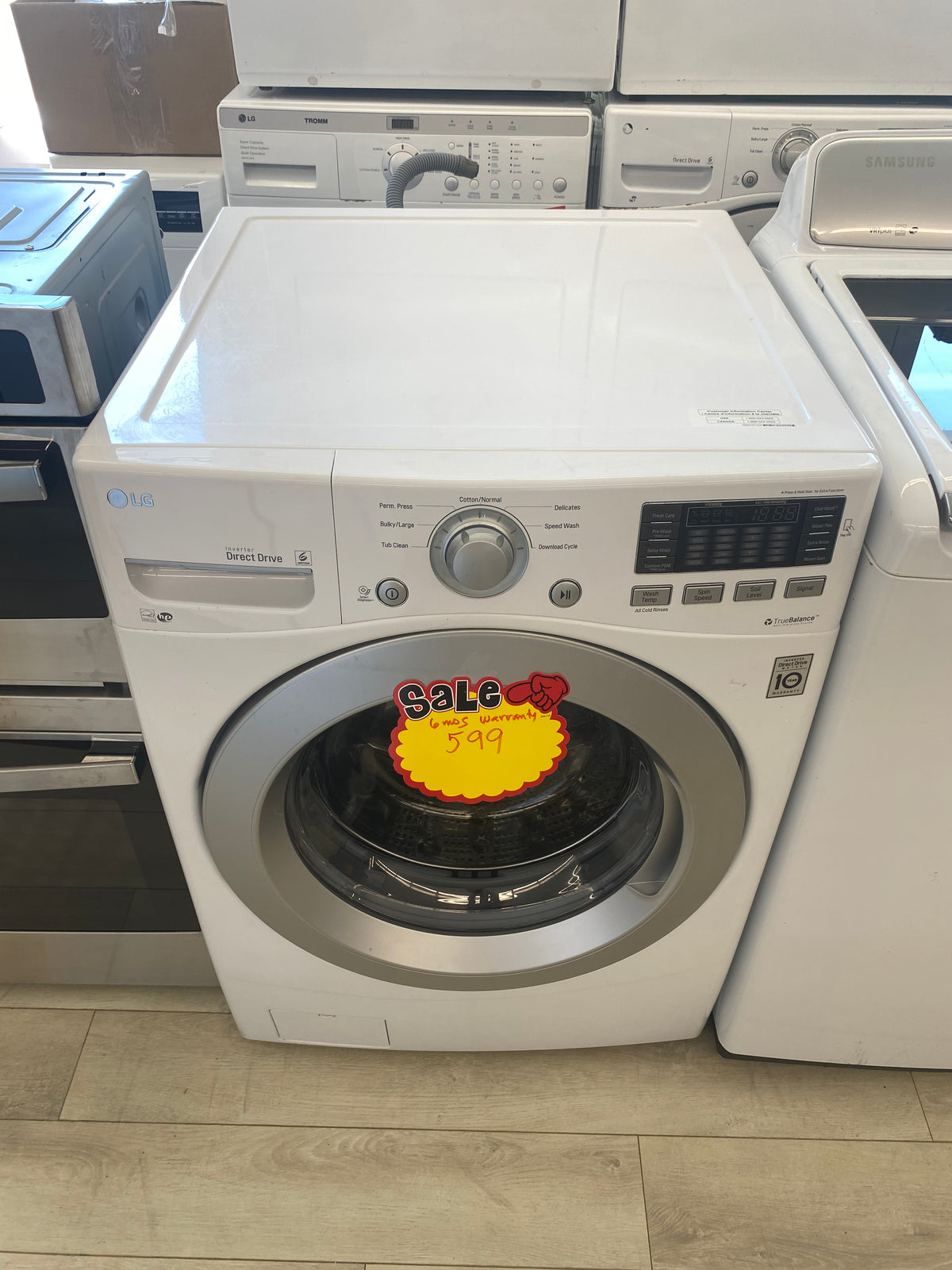27” LG front load washer, White "Refurbished"