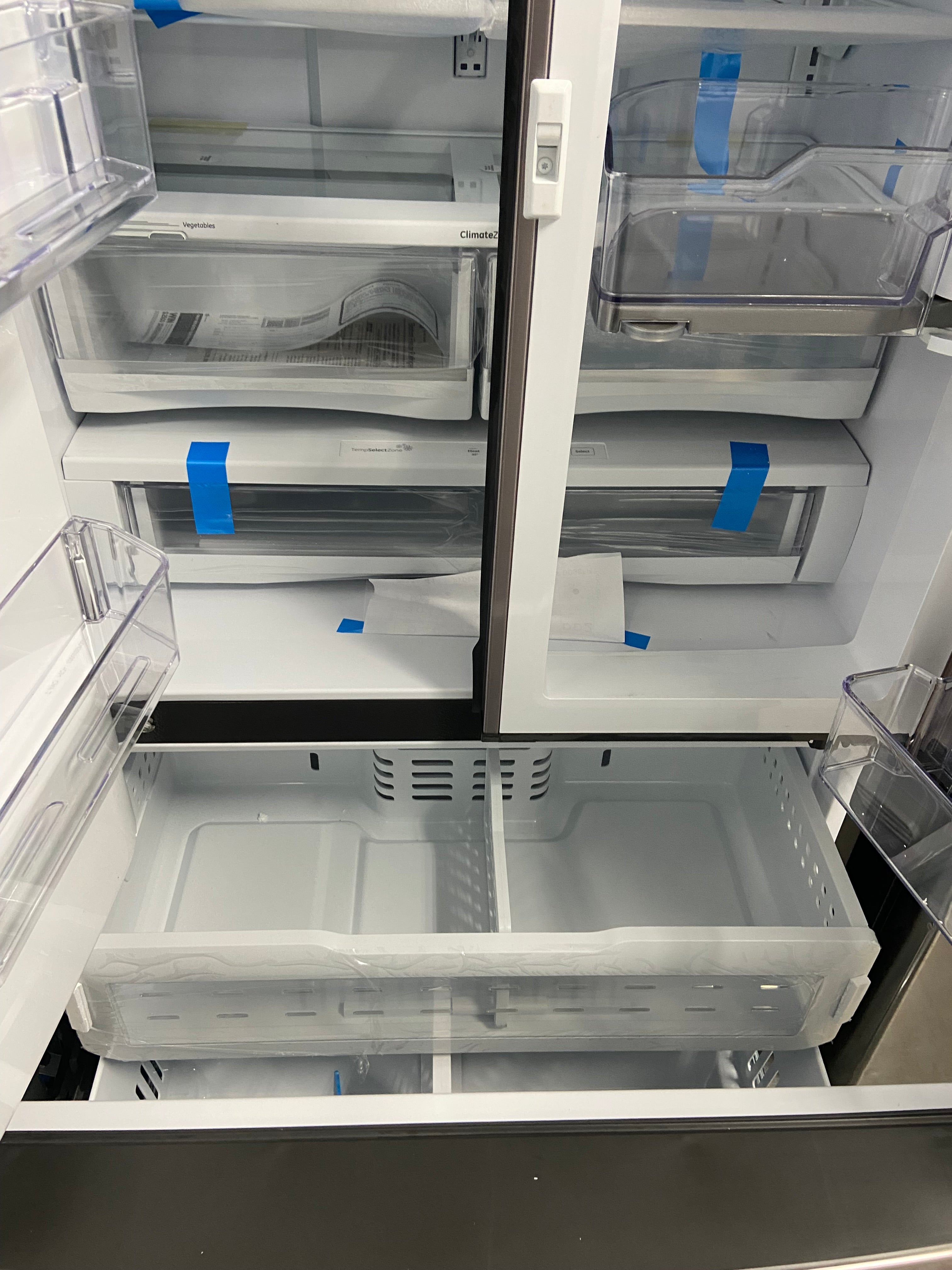 GE Brand New Stainless Fridge with Water dispenser