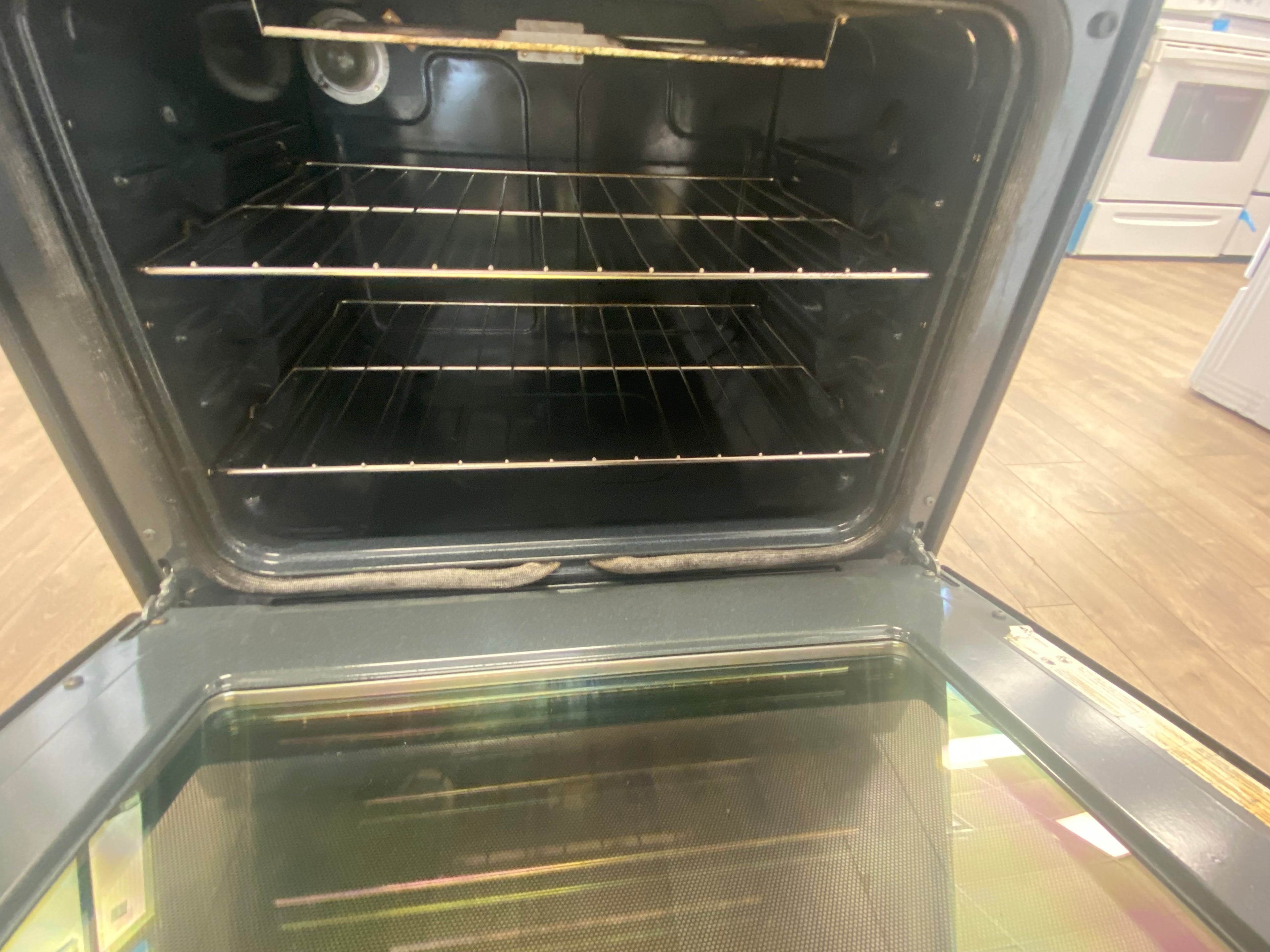 GE Slide in Glass top stove, "Refurbished" Stainless.