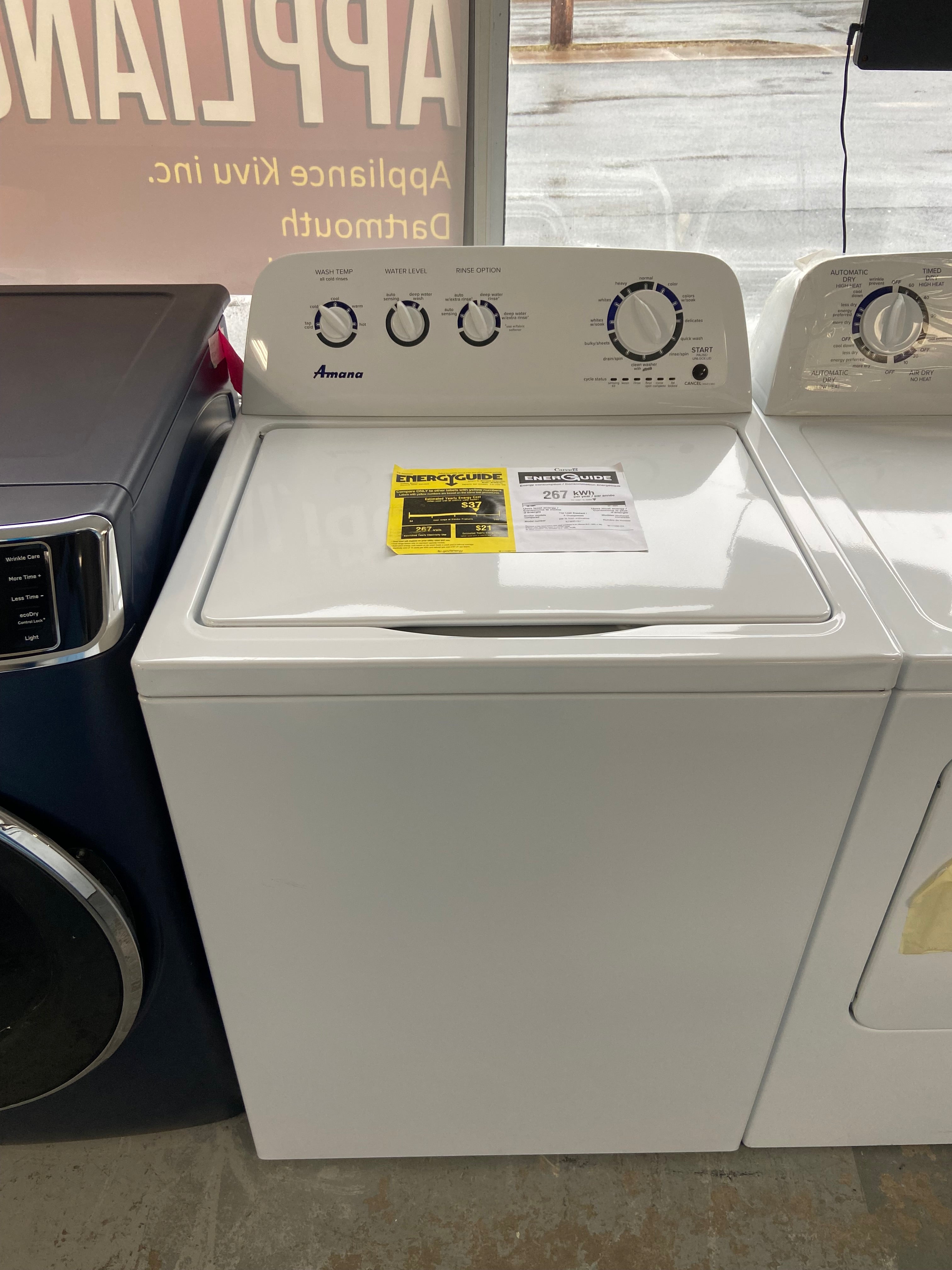 4.4 cu. ft. Top-Load Washer with High Efficiency Agitator, Measuring at a width of 29 inches, the Amana YNED4655EW1 Dryer
