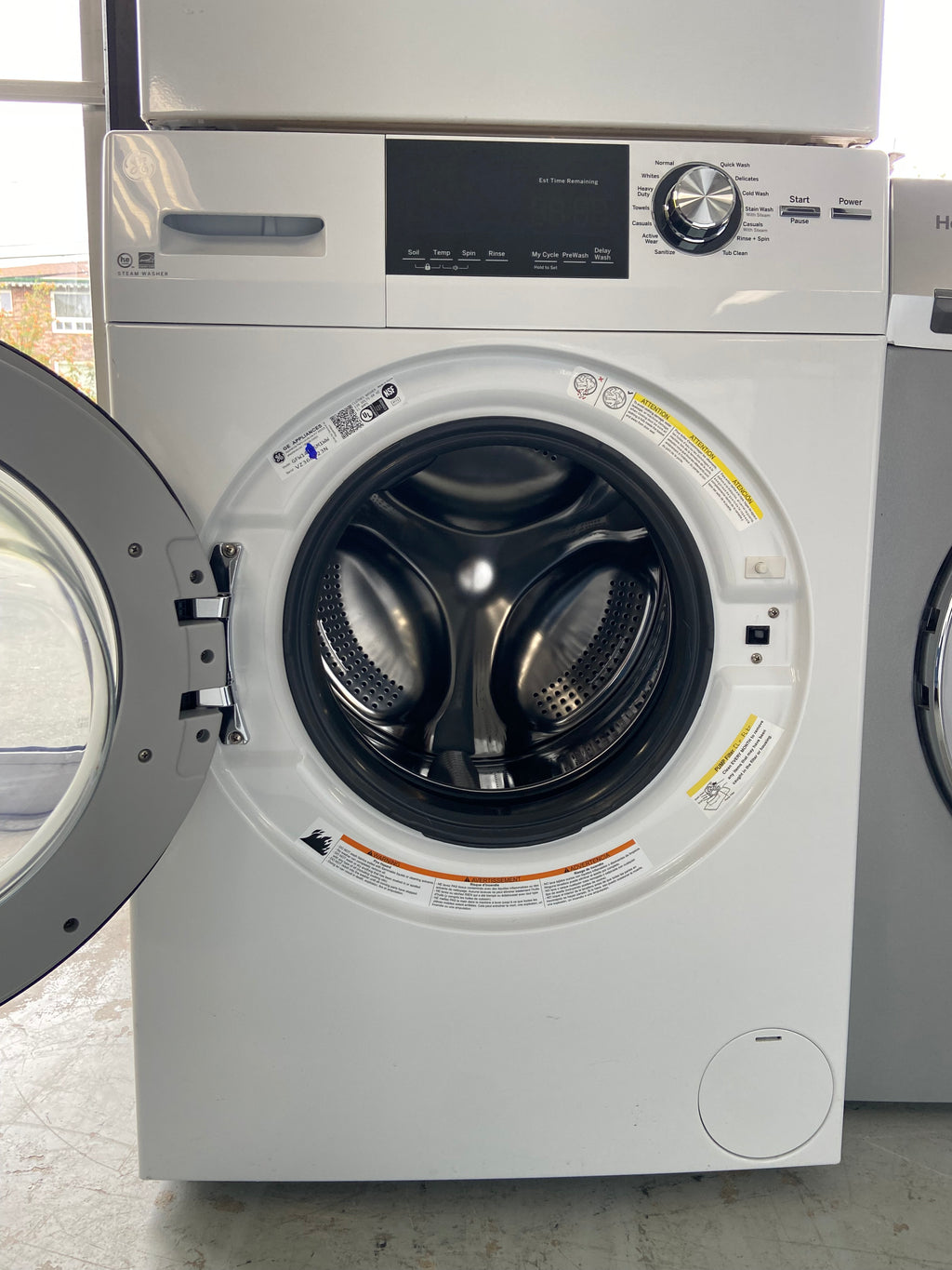 White 24” GE GFD14JSINOWW/GFW148SSM1WW Stackable Washer And Dryer Set (Scratch & Dent)