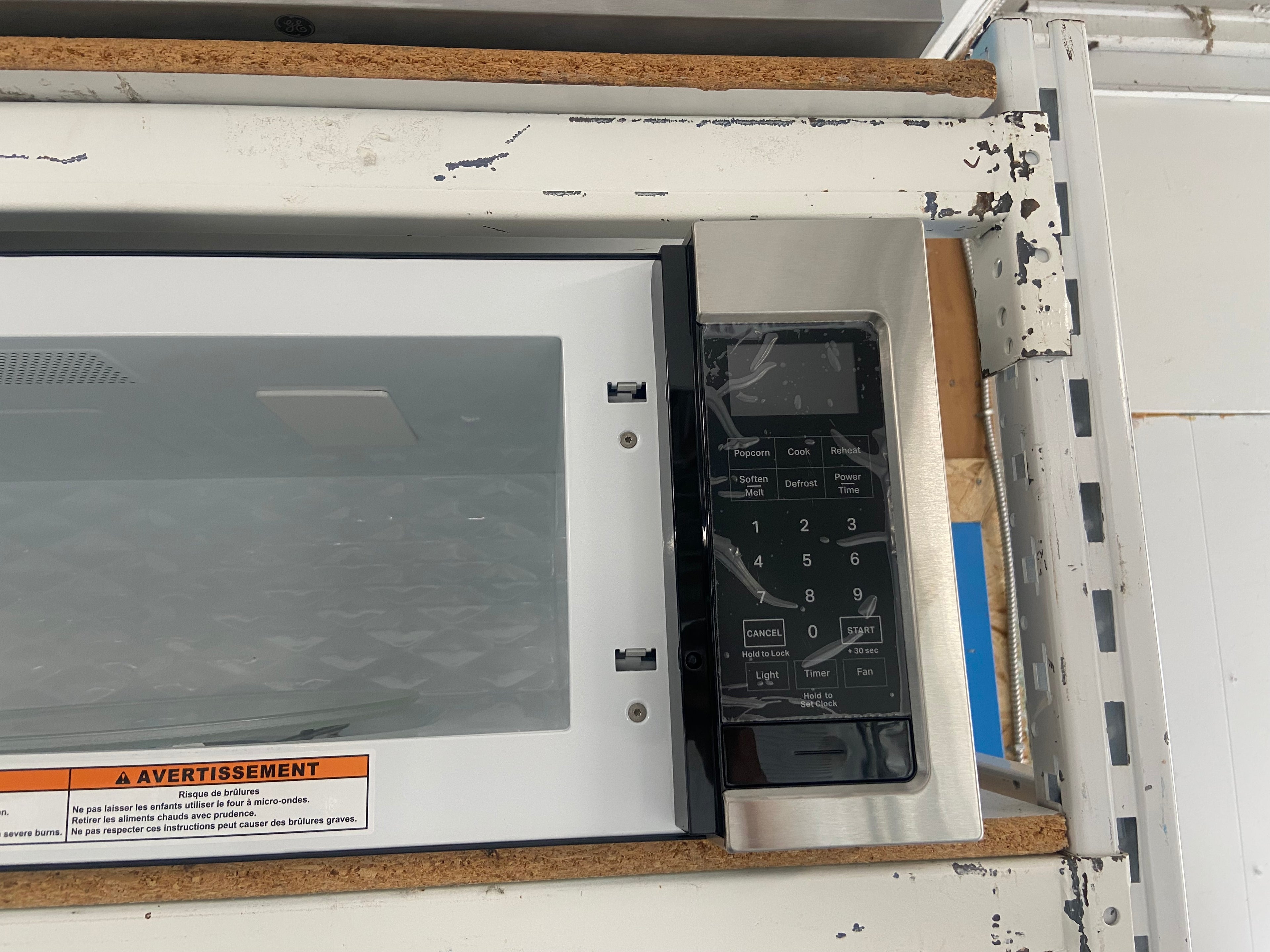 Whirlpool Stainless Over The Range Microwave "Brand New"